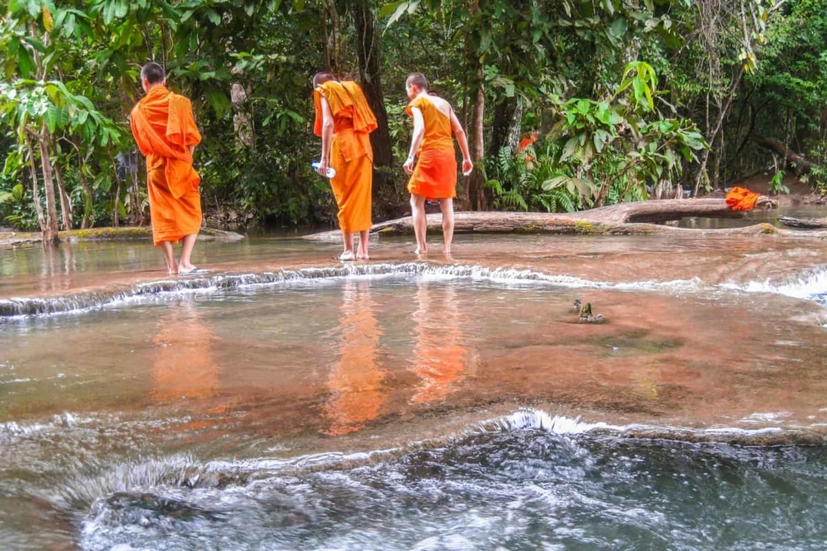 Monks at the Top of the Waterfall