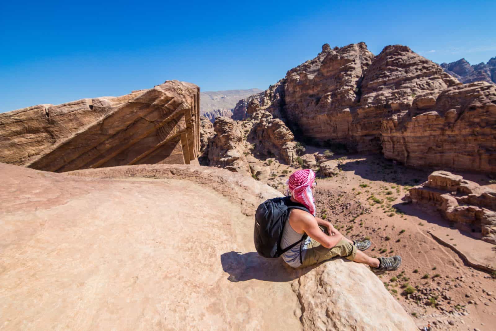Sitting on top of the Monastery in the city of Petra, Jordan