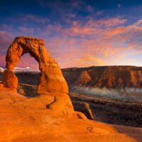 A surreal sunset at Delicate Arch inside Arches National Park, Utah