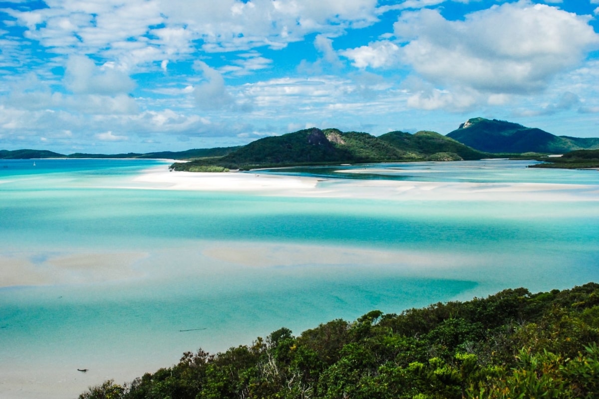 You could travel and work on a boat cruising the Whitsunday Islands!