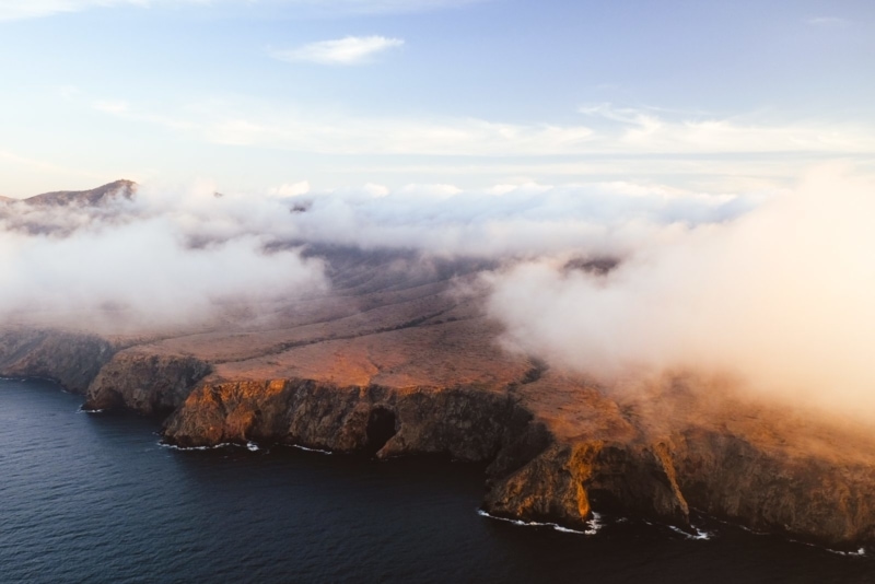 Clouds rolling in over Santa Cruz Island, shot from a helicopter