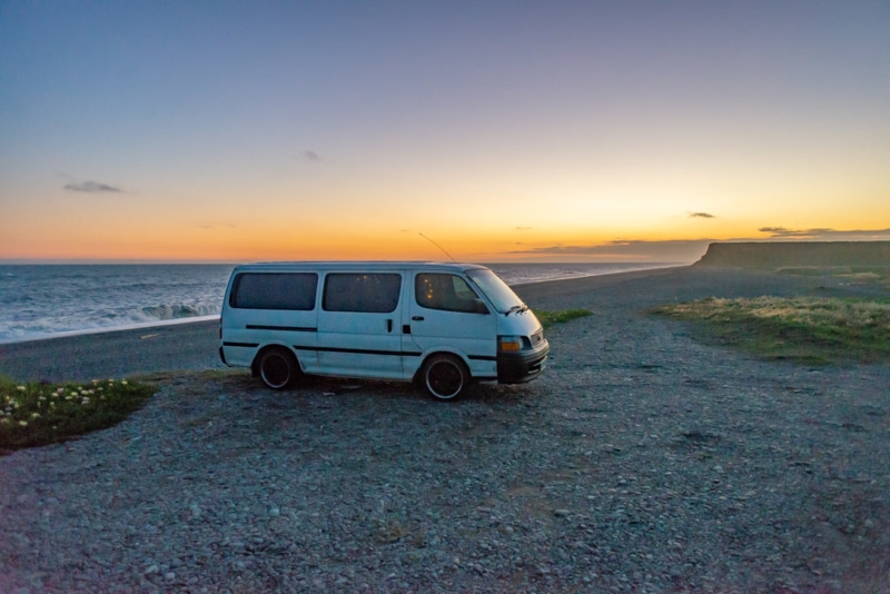 Staying in a self-contained campervan can help you backpack New Zealand on a budget.