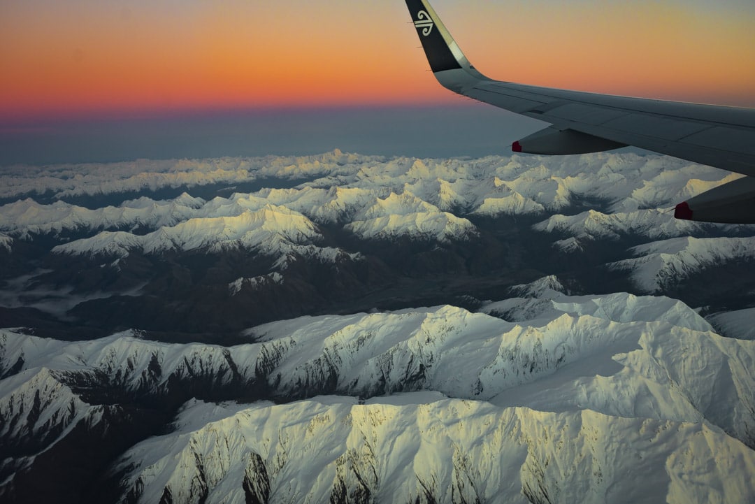 The Cost of Backpacking New Zealand on a Budget - Flying Into Queenstown