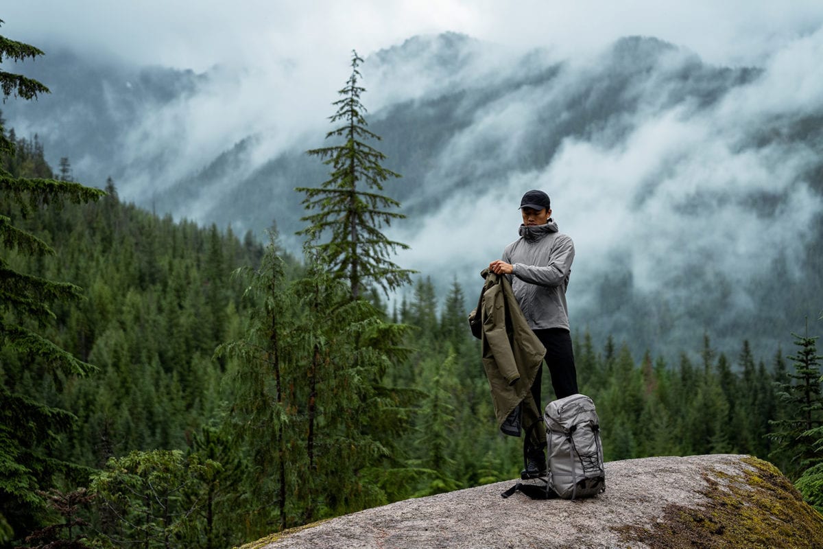 man wearing an Arc'teryx jacket in the mountains